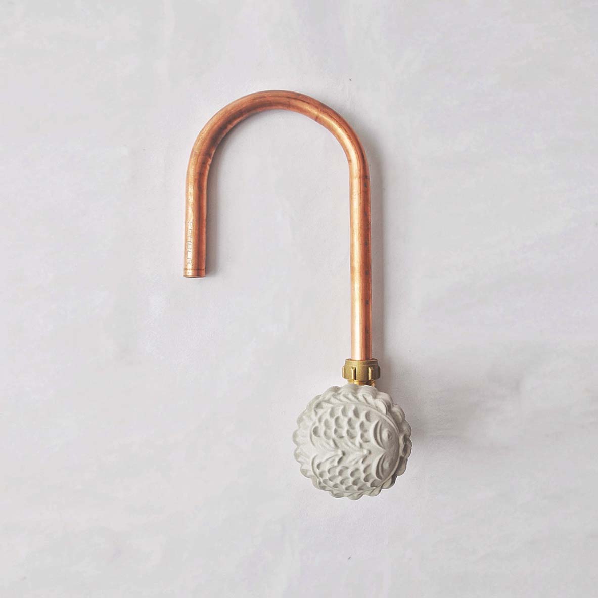 KUIH CONCRETE & COPPER TAP